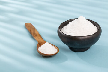 Bowl With Baking Soda; Photo Blue Background