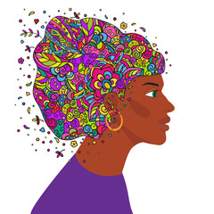 Profile of an afro american woman in a bright national headscarf. Vector colorful doodle. Hand drawing isolated on a white background.
