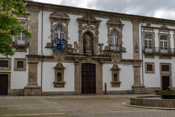 Fototapeta premium historic house fronts on the Praca de Sao Tiago square in the historic city center