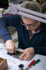 a technician repairing a radio