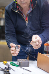 a technician repairing a radio