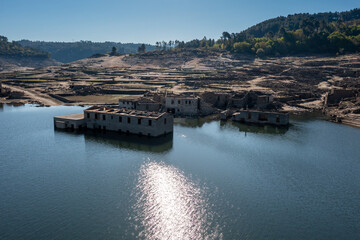 drone view of the ghost town of Aceredo in the Alto Lindoso reservoir