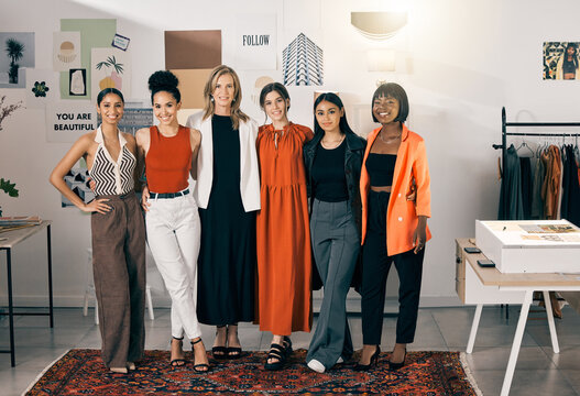 The future of fashion. Shot of a group of businesswoman standing in an office at work.