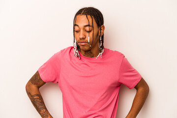 Young African American man isolated on white background dreaming of achieving goals and purposes