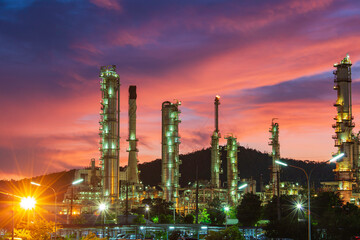Plakat Oil​ refinery​ and​ plant and tower column of Petrochemistry industry in oil​ and​ gas​ ​industrial with​ cloud​ red​ ​sky the evening​ sunset