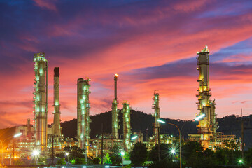 Fototapeta na wymiar Oil​ refinery​ and​ plant and tower column of Petrochemistry industry in oil​ and​ gas​ ​industrial with​ cloud​ red​ ​sky the evening​ sunset