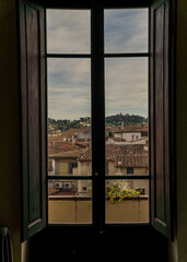 view from inside a room with landscape of Florence, Italy 