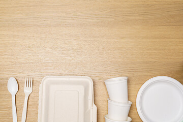 Eco friendly concept, Food container set and paper cup of biodegradable on wooden background
