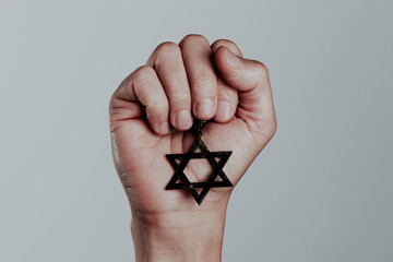 star of david in the hand of a man