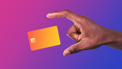 Male Hand Holding Credit Card Over Purple Neon Background, Cropped