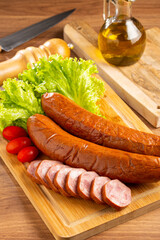 Raw smoked sausage on the table. Calabrese sausage.