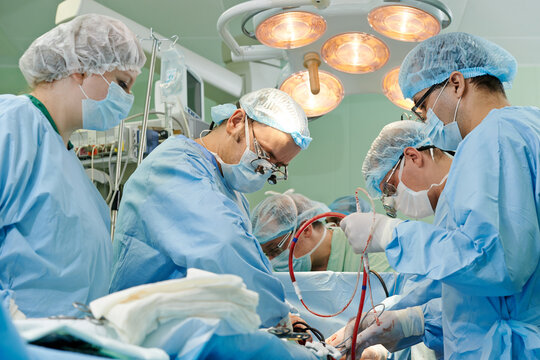 surgeons team at cardio surgery operation in clinic