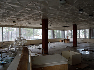 Interior of ruined, abandoned administrative, residential building. The ruins of an abandoned...