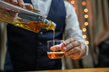 Bartender Serve Whiskey, on wood bar, 