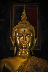 Fototapeta premium Wat Prayoon, a temple in Bangkok with beautiful Buddha images and murals.Photo taken on January 2, 2022 in Bamgkok,Thailand.