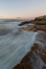 Flow of water around the rocky seascape.