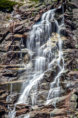 Long exposure flowing water from waterfall © Jaroslav Moravcik