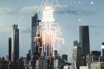 Double exposure of virtual creative light bulb hologram with chip on New York city skyscrapers background, idea and brainstorming concept