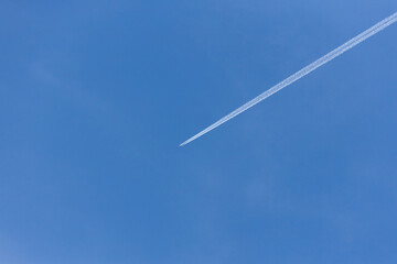 plane flies on the sky and the sun backgrounds