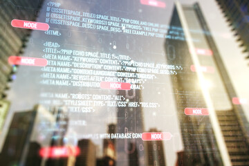 Double exposure of abstract programming language interface on modern skyscrapers background, research and development concept