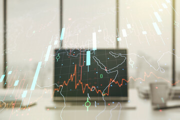 Multi exposure of abstract creative financial chart with world map on laptop background, research and analytics concept