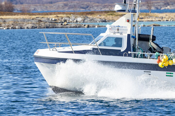Fototapeta premium Motor boat in the sea,Northern Norway,scandinavia,Europe
