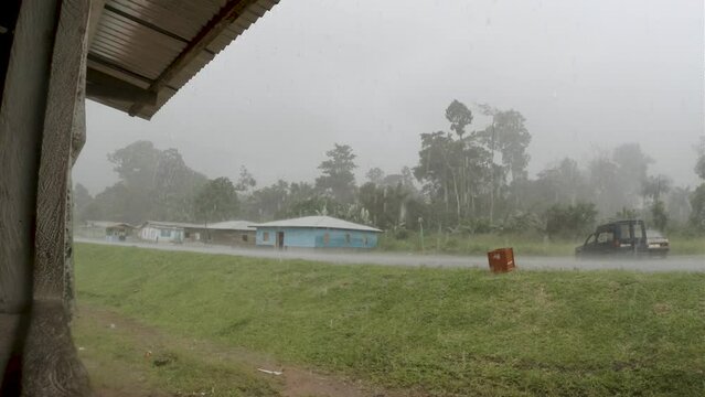 Village in Africa. Tropical downpour in an African village. Equatorial Guinea