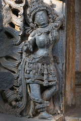 Fototapeta na wymiar Hoysaleswara Temple sculpture work Halebidu Karnataka India, 12th-century Hindu temple dedicated to Shiva, It is the largest monument in Halebidu, the former Hoysala capital.