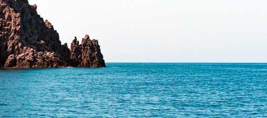 rocky coast, seascape, seaview of dangerous rocks at the shore