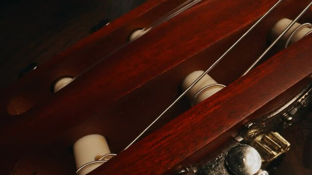 Guitar pegs on a six-string Spanish guitar.