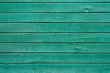 Industrial background - view of the wall of a old wooden railway wagon. Background of wooden boards close up