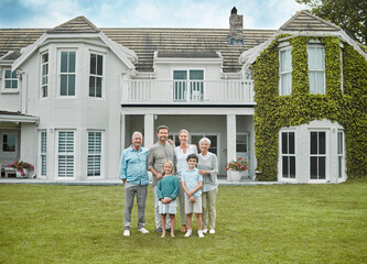 You cant buy happiness but you can buy the house that brings happiness. Shot of a multi-generational family standing together outside. - obrazy, fototapety, plakaty