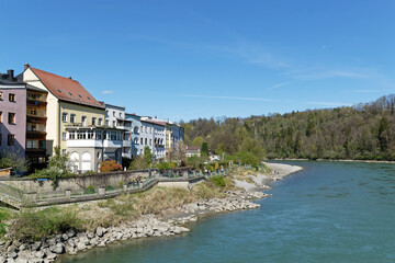 Fototapeta na wymiar City view of Wasserburg am Inn. Colorful house facades on the banks of the Inn River.