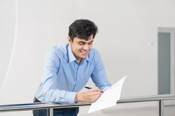 young businessman with documents
