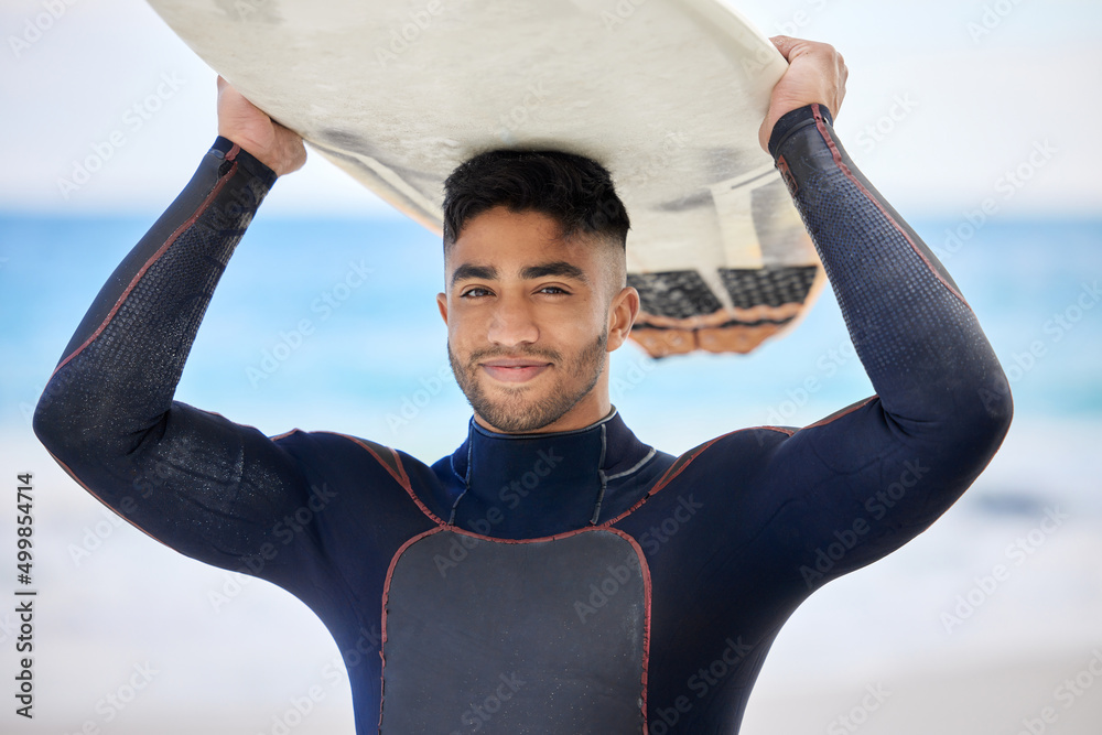 Sticker This is my happy place. Shot of a young man holding a surfboard at the beach.