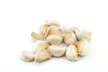 Closeup of a group lobe garlic (Allium sativum)cloves vegetable Isolated on white background, spiciness aromatic herb