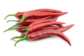 A group of fresh raw ripe hot organic red chili peppers whole isolated on white background clipping path