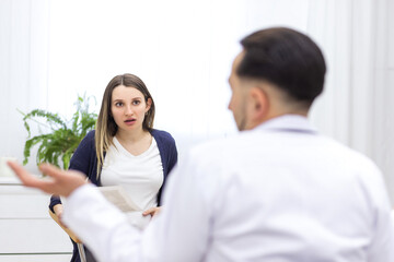 Fototapeta premium Photo of pregnant woman visiting her doctor.