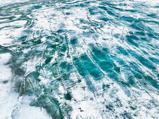 Frozen river. Icy snowy background. Aerial view