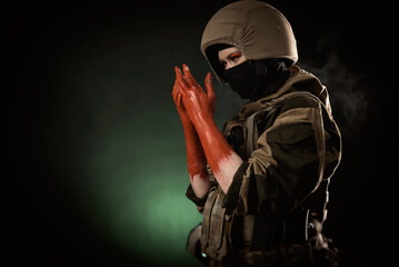 a girl soldier with bloodied hands wearing a helmet and a bulletproof vest