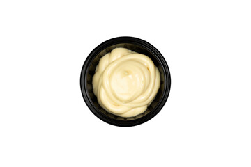 soy sauce in a dish for sauces on a white background