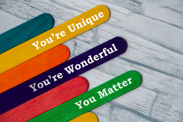 Motivational quote text on colorful wooden stick. Motivational and inspirational concept