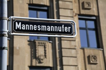 Fototapeta premium Dusseldorf city, Germany. Mannesmannufer city street sign.
