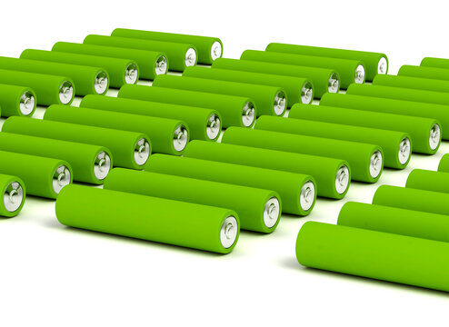 Green batteries on white background