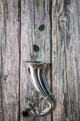Bass clarinet bell on the wood table