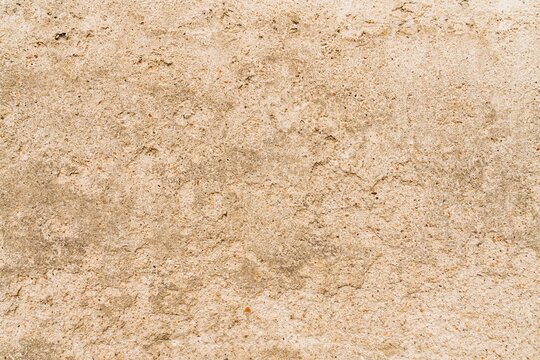 Mur en cr&eacute;pi textur&eacute; de couleur beige pouvant service de fond 