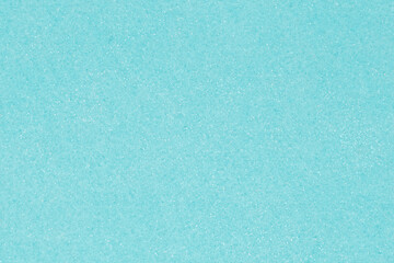 Pale teal felt material with sparkles background