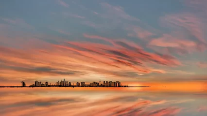 Tuinposter city  at sunset view from window shadow urban   sunset at sea gold reflection in water wave  nature landscape summer background © Aleksandr