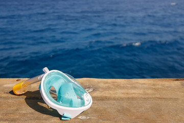 full face snorkel mask on wooden pontoon