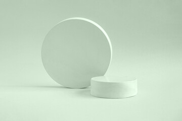 Podium for cosmetic product presentation. Abstract minimal geometrical form. Cylinder stone sphere one form, shadow. Scene to show products. Showcase, display. Trendy sunlight. Front view. 3D